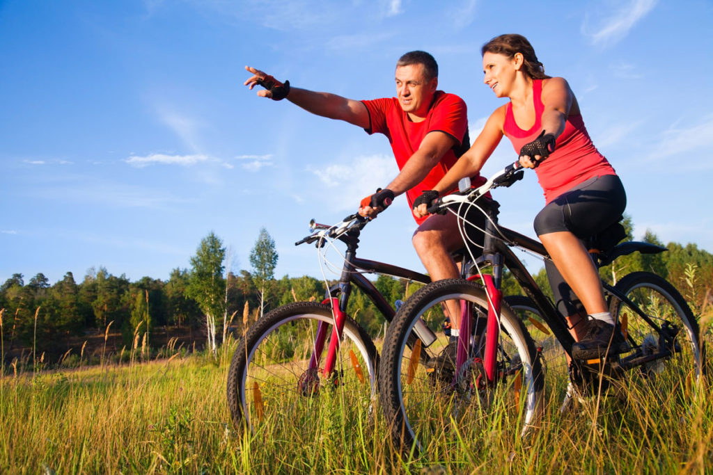Couple riding bikes