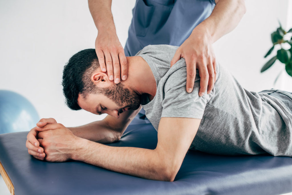 Man with chiropractor